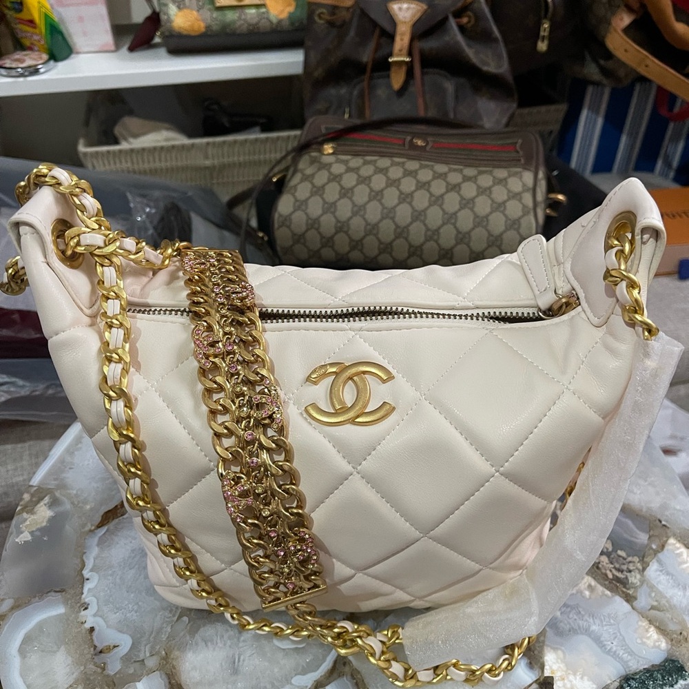 New VIP CC Cream Quilted Bag with Gold Chain Accent.
